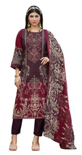 Woman wearing a maroon embroidered outfit with a matching dupatta