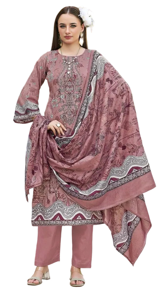 Woman in a pink traditional outfit with a matching dupatta 