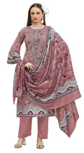 Woman in a pink traditional outfit with a matching dupatta 