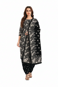 Woman wearing a black and white floral printed outfit with a matching dupatta 