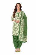 Woman wearing a green and white patterned outfit with matching pants, on a white background.