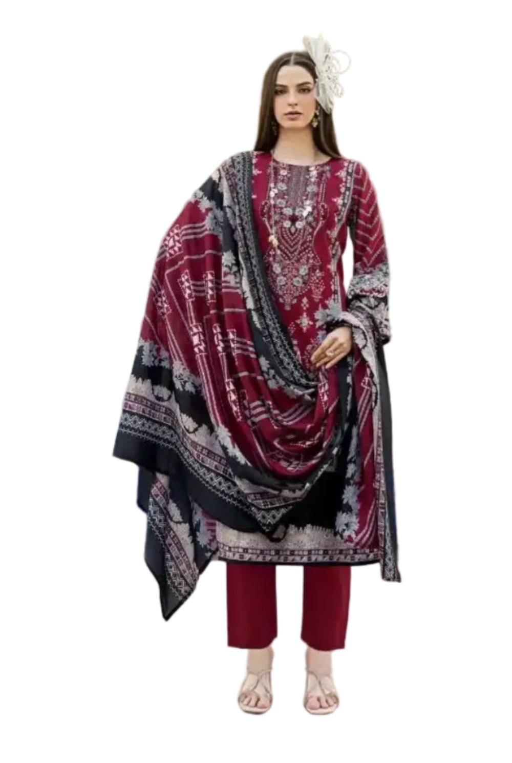 A woman modeling a traditional South Asian outfit with a deep red and black patterned kurta, matching pants, and a coordinating dupatta, set against a background of white arched alcoves and a blue pool. The image is presented as a magazine or catalog page with the headline 'THE FORM OF EXPRESSION'.